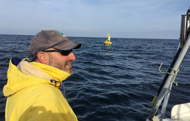 WCS Ocean Giants Director Howard Rosenbaum and acoustic buoy off Long Island Coast CREDIT Stephen Sautner WCS
